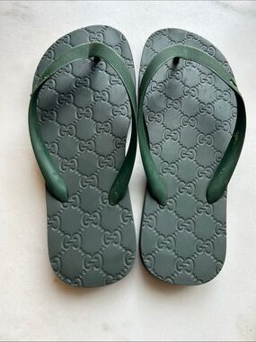 Gucci Unisex  Rubber GG Embossed Rubber Flip Flops